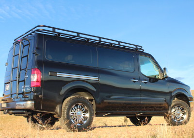 Nissan 4x4 Van with Rear Ladder and Roof Rack